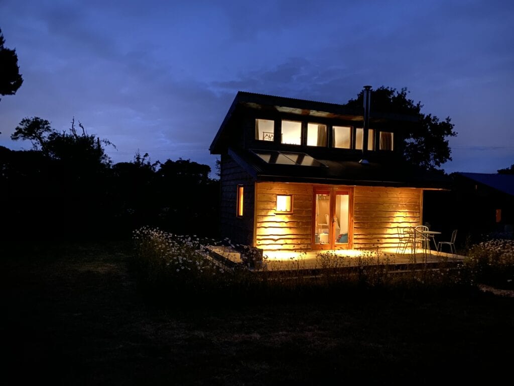 Tiny Homes Holidays - Eco-friendly lodges for off-grid vacations on the Isle of Wight, set in a natural meadow, adjacent to ancient woodland